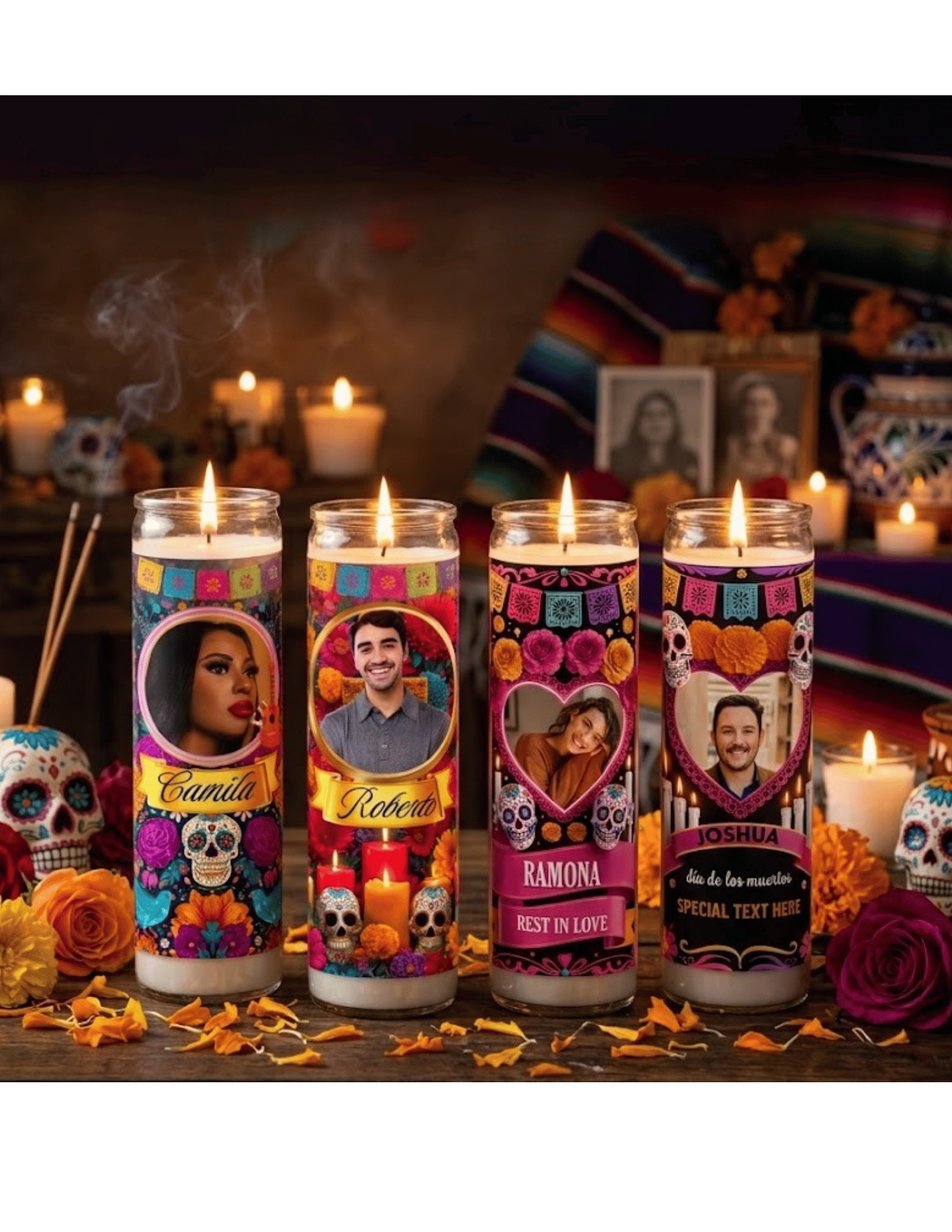 Four lit glass memorial candles personalized with portraits and names, arranged on a wooden ofrenda table with marigolds and sugar skulls